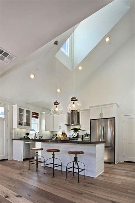 Sloped ceilings ooze with character and charm, but designing a sloped ceiling bedroom you love with sloped ceilings can be a challenge. Kitchen Skylight - Cottage - kitchen - Matt White Custom Homes