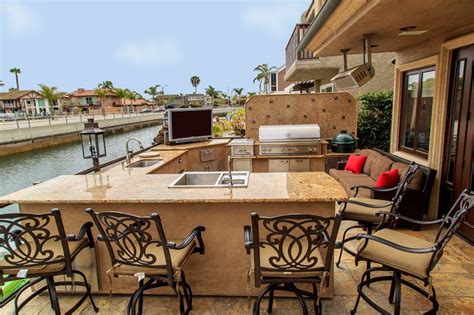 Just because outdoor kitchen kits are prefabricated doesn't mean you can't have a custom look. Custom Outdoor Kitchens & BBQ Islands - Hardscape Concepts