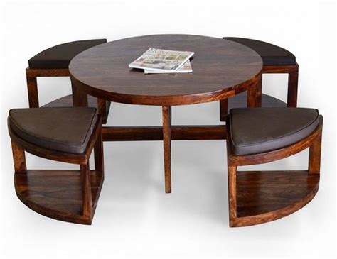 How wide the chairs are will dictate how many measure the height of the arms on your chairs to make sure that they will fit underneath the apron of the table at its lowest point along the edge. Coffee Table With Chairs Underneath | Roy Home Design