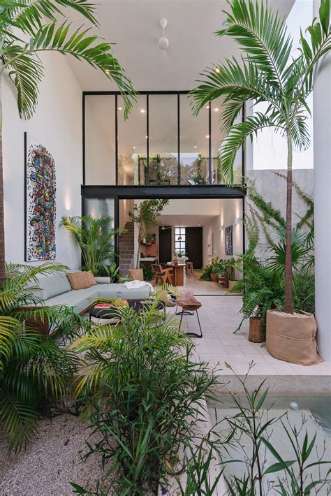 The Simple Exterior Of This Home Hides The Tropical Paradise Within It