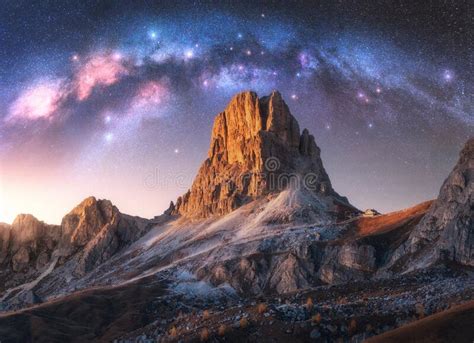 Milky Way Acrh Over Beautifull Rocks At Starry Night In Summer Stock