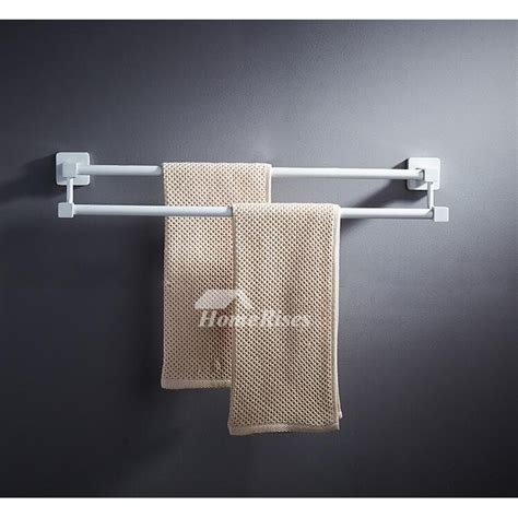 These dark wood racks, sold individually, are wall mounted. Modern Wall Mount White Towel Rack Bathroom