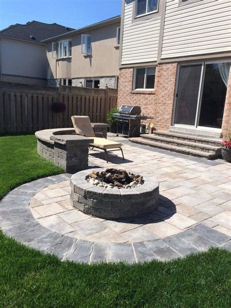Start by grabbing the larger stones and placing them around the perimeter of the patio. Pro-Loc interlocking and Landscape Design | HomeStars ...