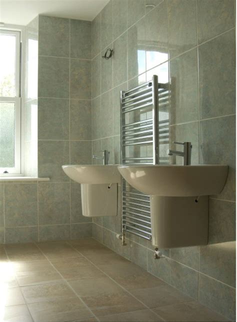 Who wouldn't want a we prefer ceramic or porcelain tile in bathrooms. Floor tiling and wall tiling - Abacus Decorating