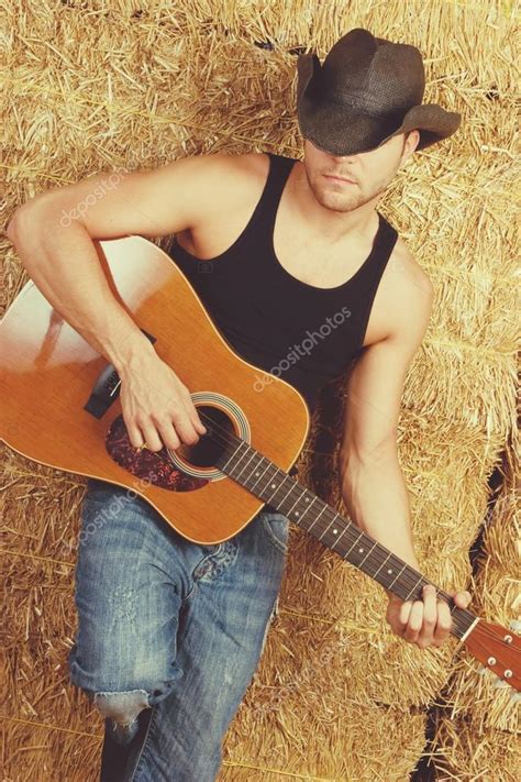 Cowboy Playing Guitar Stock Photo By ©keeweeboy 123856524