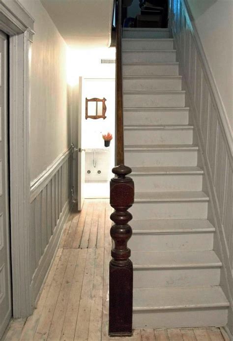 Delineate the transition with a chair or rail for more interest. Victorian, Revamped - Remodelista | Victorian hallway, Staircase design, Small staircase