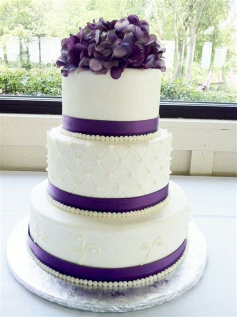 Elegant White And Purple Cake With Flowers And Ribbon To Boot Purple