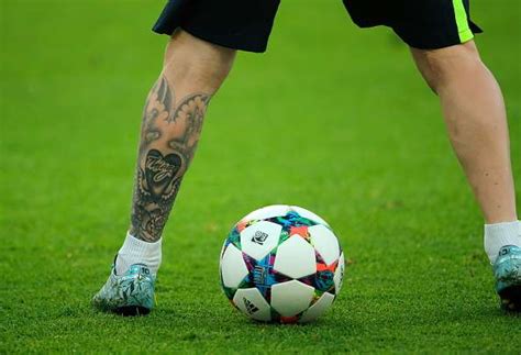 Lionel messi of barcelona shows off his new tattoo as he takes part in a training session prior to the uefa champions league final match between barcelona and. Lionel Messi's tattoos: What do they signify?