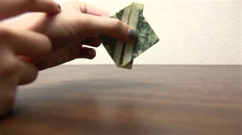 How To Fold A Dollar Into A Heart Youtube