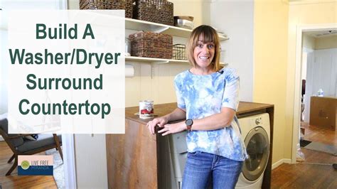 A stacked washer and dryer are hidden behind blue lattice doors located under stacked blue upper cabinet s in a beautiful blue laundry room. DIY Washer Dryer Surround in our Rental Kitchen - YouTube