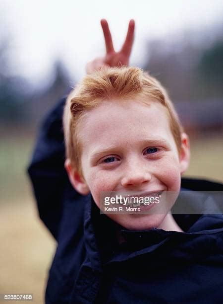 Two Fingers Child Photos And Premium High Res Pictures Getty Images