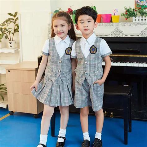 China Manufacturer Custom Good Quality Child Plaid School Uniform