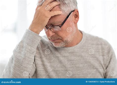 Senior Man Suffering From Headache At Home Stock Image Image Of