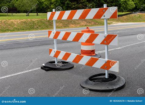 Orange And White Striped Three Bar Traffic Barrier Road Closed