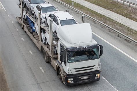 Car Transporter Truck Transports Cars On Highway Stock Photo Image Of