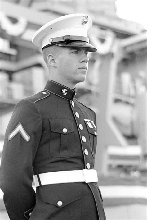 A Marine Corps Color Guard Stands At Attention During The