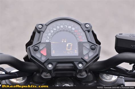 While generous clearance allows for large lean angles. TESTED: 2017 Kawasaki Z650 ABS vs Kawasaki ER6N ...