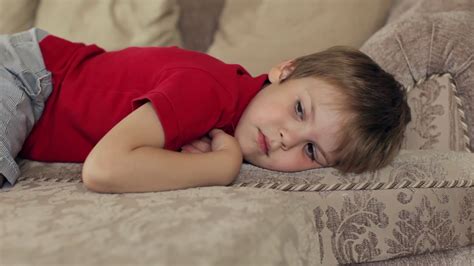 Boy Lying On Couch Stock Footage Sbv Storyblocks