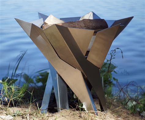 Our fire pits are the perfect hybrid for backyard campfires and over the fire cooking, bringing outdoor adventures to you every day. Phoenix Blossom - Sculptural Stainless Steel Fire Pit