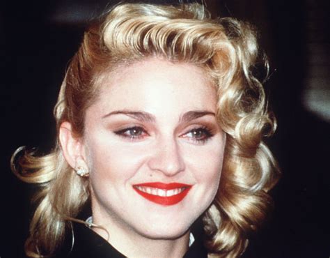 Madonna's never been one to shy away from (or start) fashion trends. Photo: Madonna's tooth jewelry — flattering or not?