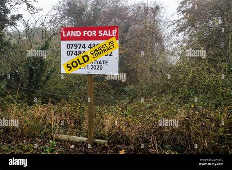 Land For Sale Sign With Sold Banner On It Stock Photo Alamy
