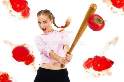 Lady Beating Off Tomatoes With A Baseball Bat Stock Photo Image Of