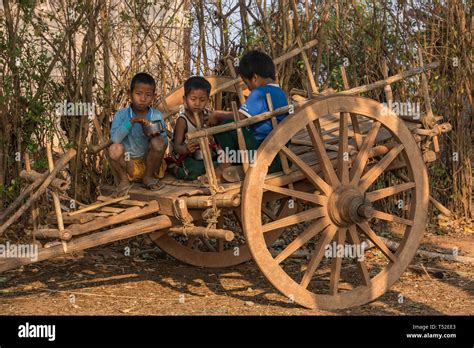 Shan Children Eating Their Lunch On An Oxcart On The Trek From Kalaw To