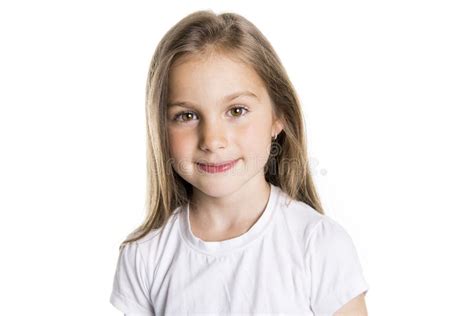 Portrait Of A Cute 7 Years Old Girl Isolated Over White Background