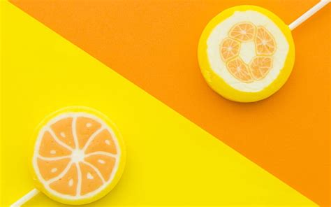 Candy Lollipop Orange Texture Yellow Sweet Hd Wallpaper Peakpx