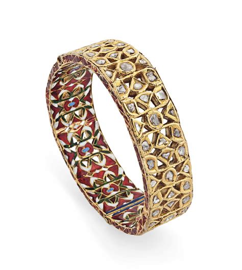 A DIAMOND-SET AND ENAMELLED GOLD BRACELET , NORTH INDIA, 19TH CENTURY