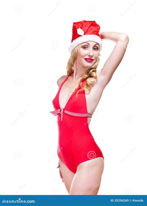 The Beautiful In A Red Cap Of Santa Claus Portrait On A White