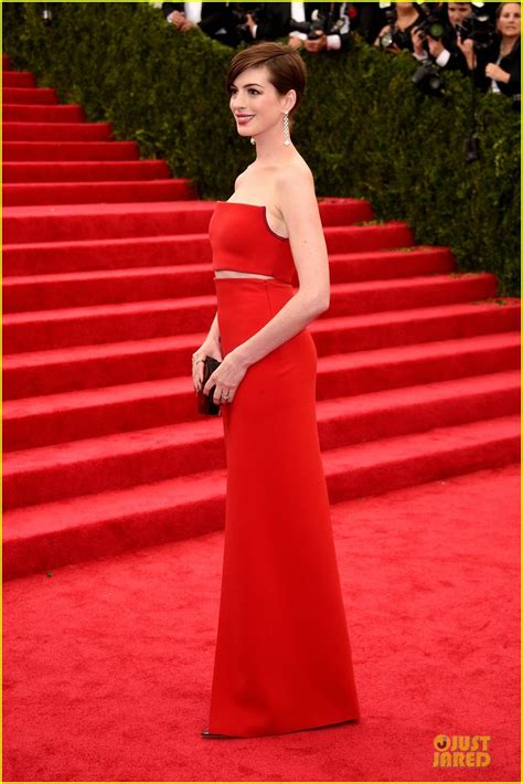Anne Hathaway Flashes Midriff In Red Hot Dress At Met Ball 2014 Photo
