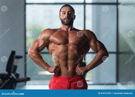 Healthy Young Man Flexing Muscles Stock Photo Image Of Exercise