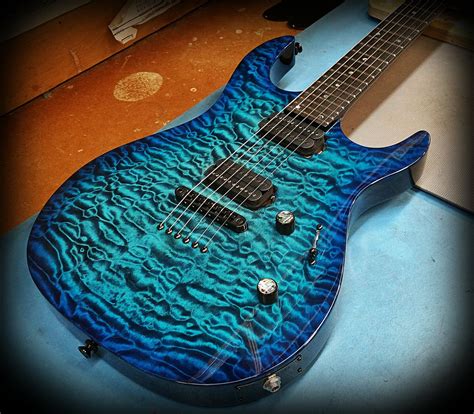Carvin Dc600 In Deep Aqua Burst Over A Quilted Maple Top Acoustic