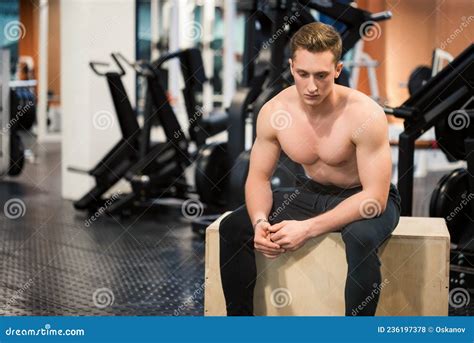 Close Up Of Male Topless Athlete Sitting At Gym Stock Photo Image Of