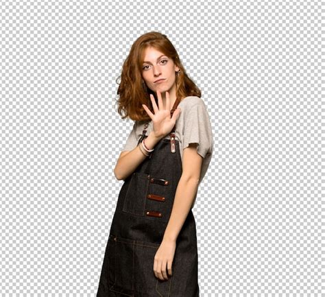 Premium Psd Young Redhead Woman With Apron Counting Five With Fingers