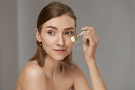 Jade Facial Roller Massage Stone And Face Serum Stock Image Image Of Acid Lifting 168231687