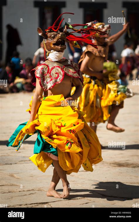 Traditional Buddhist Mask Dance At The Black Necked Crane Festival