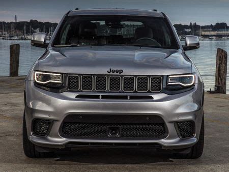 The latest jeep cherokee ditches its nontraditional styling for a more familial grand cherokee light the jeep cherokee gets a midcycle refresh for 2019, with a flatter front grille, new headlights, new taillights speaker 1: 2017-2020 Grand Cherokee Trackhawk Full Conversion Front ...