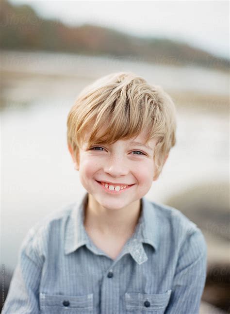 Young Blonde Boy Happy And Smiling By Stocksy Contributor Marta