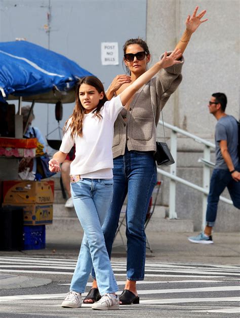 katie holmes says she kind of grew up with daughter suri cruise
