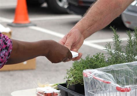In the front parking lot of newark. 'It's good to be back': Newark Natural Foods farmers ...