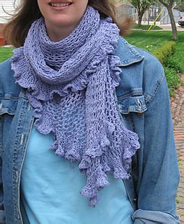 Styled with ribbing to the neckline, cuffs and hem. Ravelry: Seafoam Shawl pattern by Sarah Barbour
