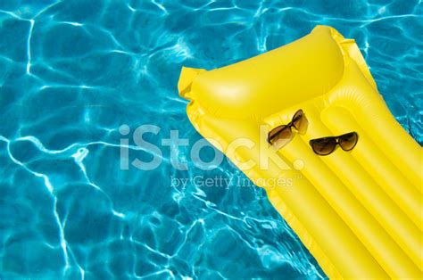 Pink Air Bed Floating On A Swimming Pool Stock Photo Royalty Free
