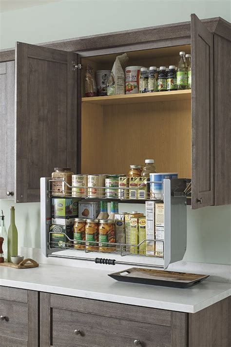 Accessible kitchen design, layouts, specifications, accessible kitchen work aisles, passageways knee space requirementsd for accessible kitchens clear floor space we include advice on choosing and installing kitchen countertops, cabinets, and kitchen or bathroom flooring, sinks, and other plumbing. Pull Down Cabinet Shelf brings items in wall cabinets ...