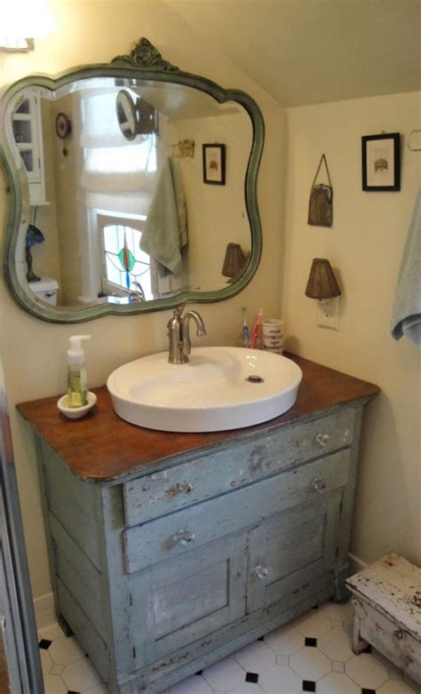 If you don't want to crowd your space, this vintage bathroom vanity will serve you perfectly. DIY Dresser to Vanity | The Owner-Builder Network