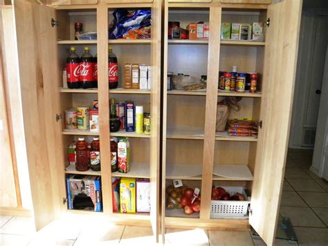 A tall wooden pantry makes a great addition to a finished kitchen. Oak Pantry Cabinet 36 Wide Tall Tv Menards Kitchen Lowes ...