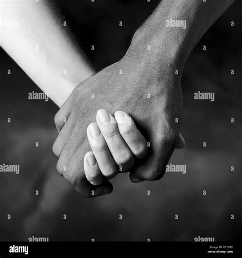 Couple Holding Hands Close Up Stock Photo Alamy