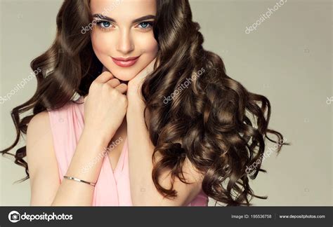 Brunette Girl Long Healthy Shiny Curly Hair Beautiful Model Woman Stock