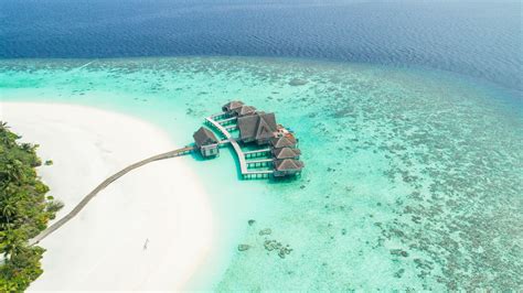 maldives 4k holidays vacation travel hotel island ocean bungalow beach sky hd wallpaper